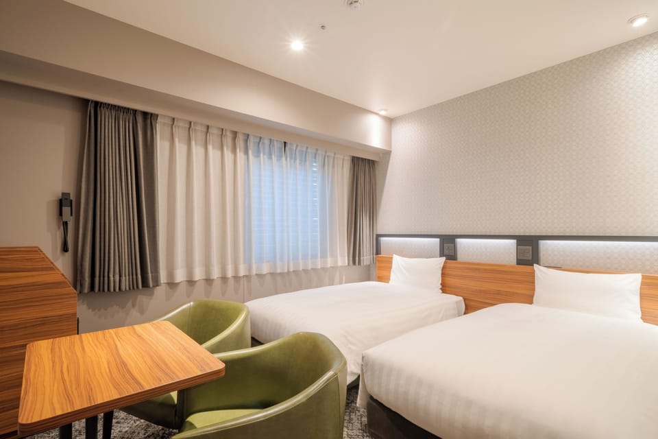 Twin Room, Non Smoking | Down comforters, laptop workspace, soundproofing, iron/ironing board