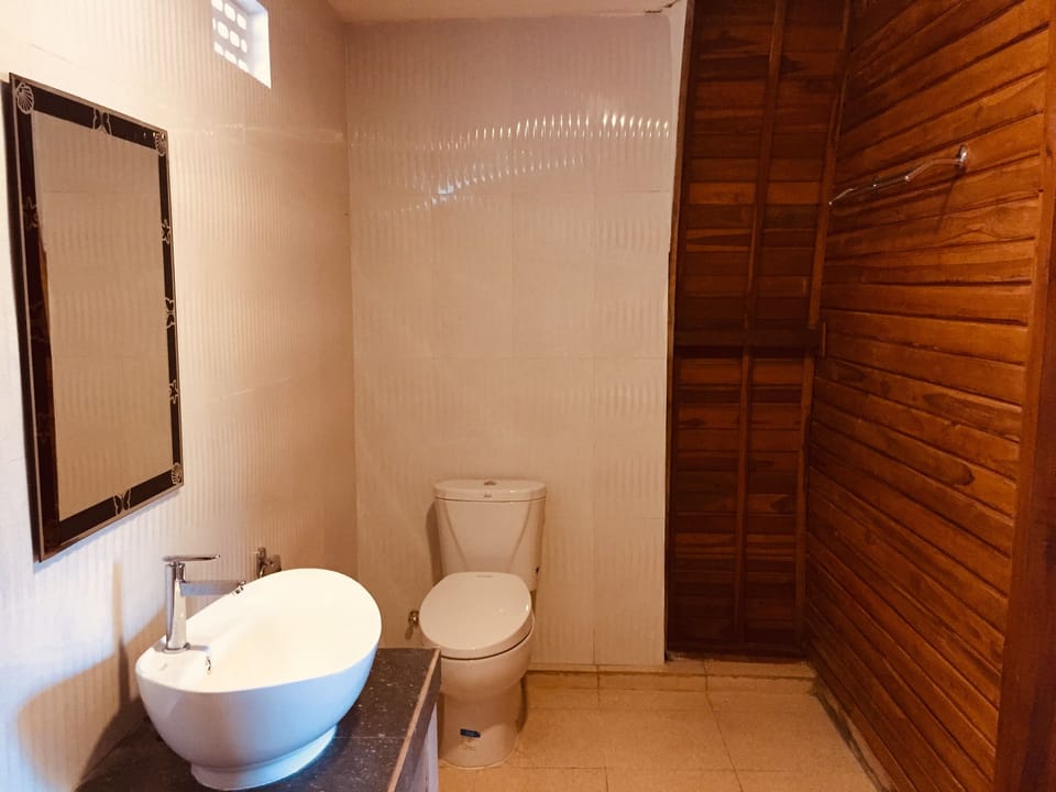 Shower, rainfall showerhead, towels, soap