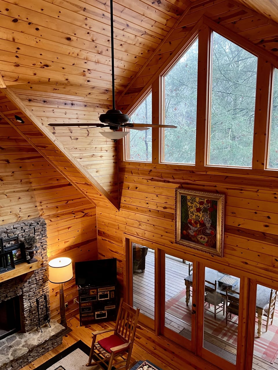 View from second living room/loft looking down on main living room.