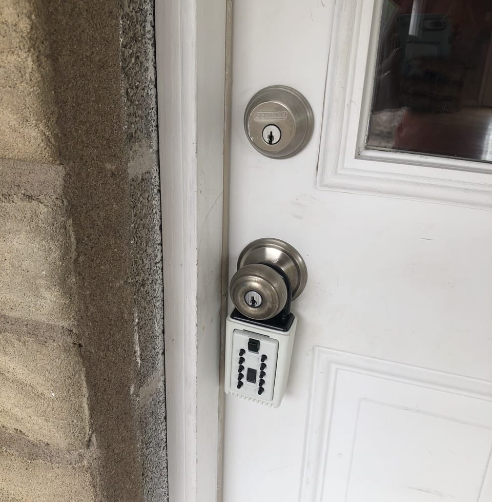 Lock box for entry on back patio door