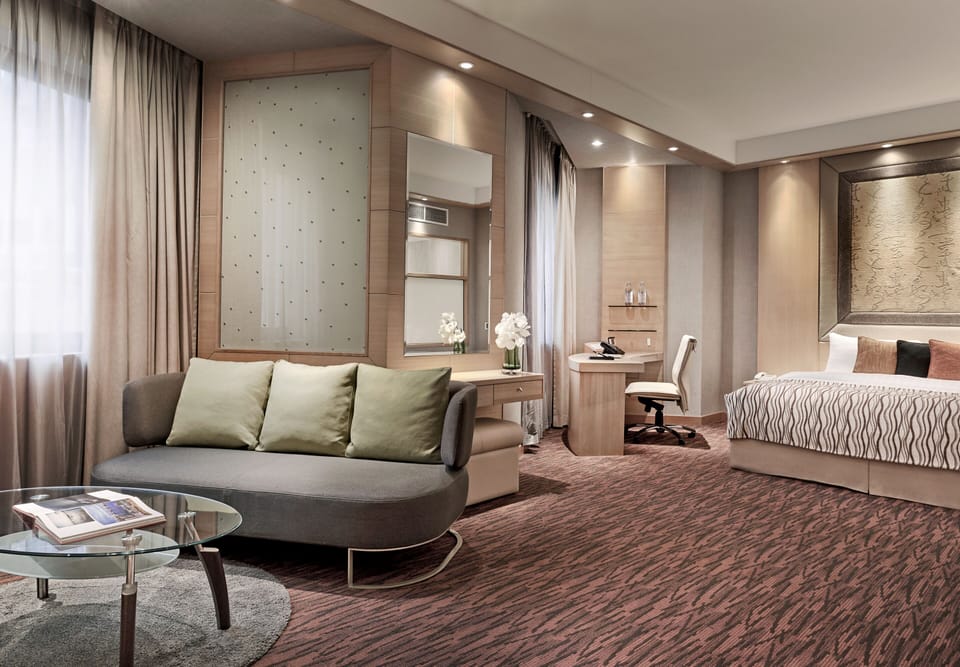 Suite | Minibar, in-room safe, blackout drapes, iron/ironing board (on request)