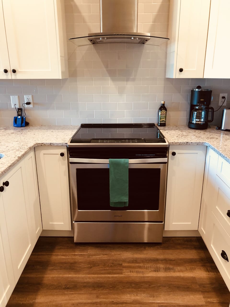 Fully fitted kitchen with dishwasher and oven complement the Weber barbecue