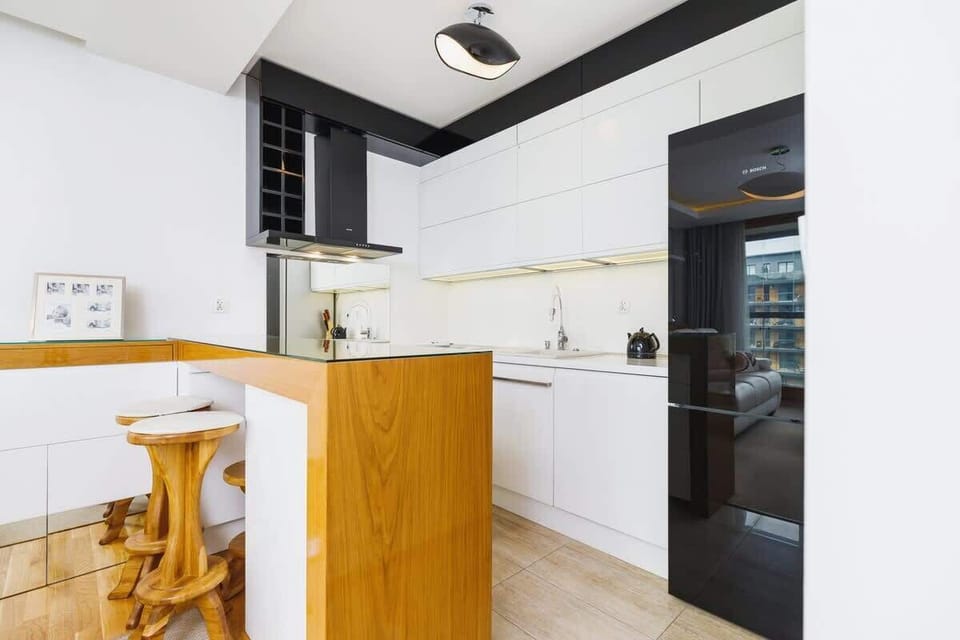 Cook and dine in style with the modern kitchenette and dining area. 