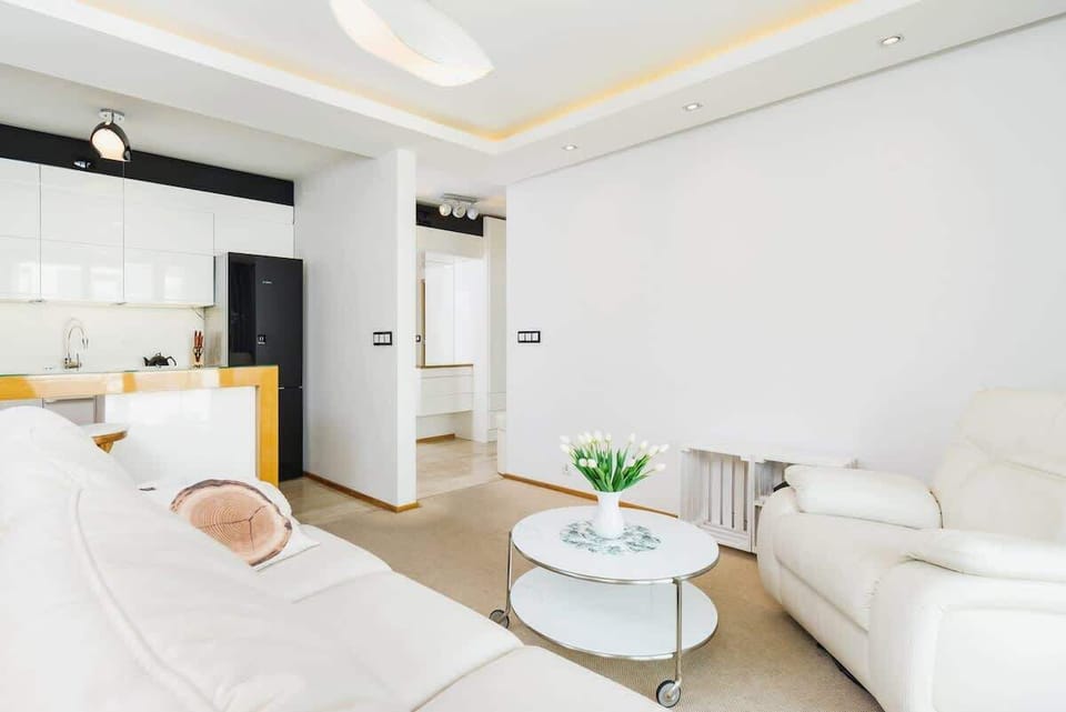 The elegant living room perfect for both relaxation and entertainment.