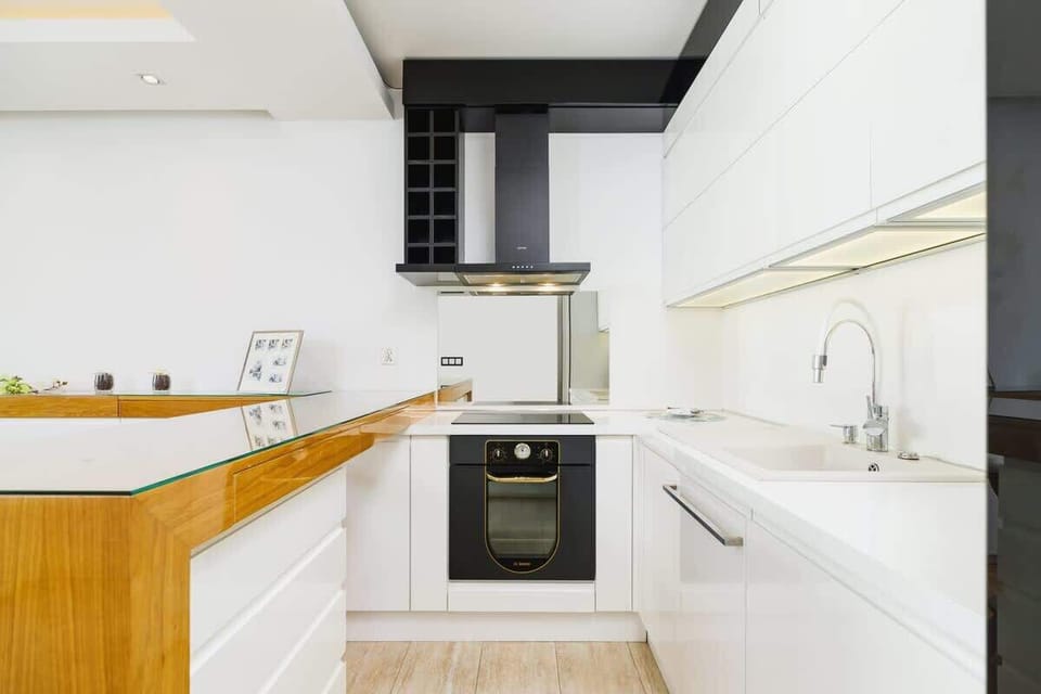 The fully equipped kitchenette includes everything you need for a home-cooked meal.