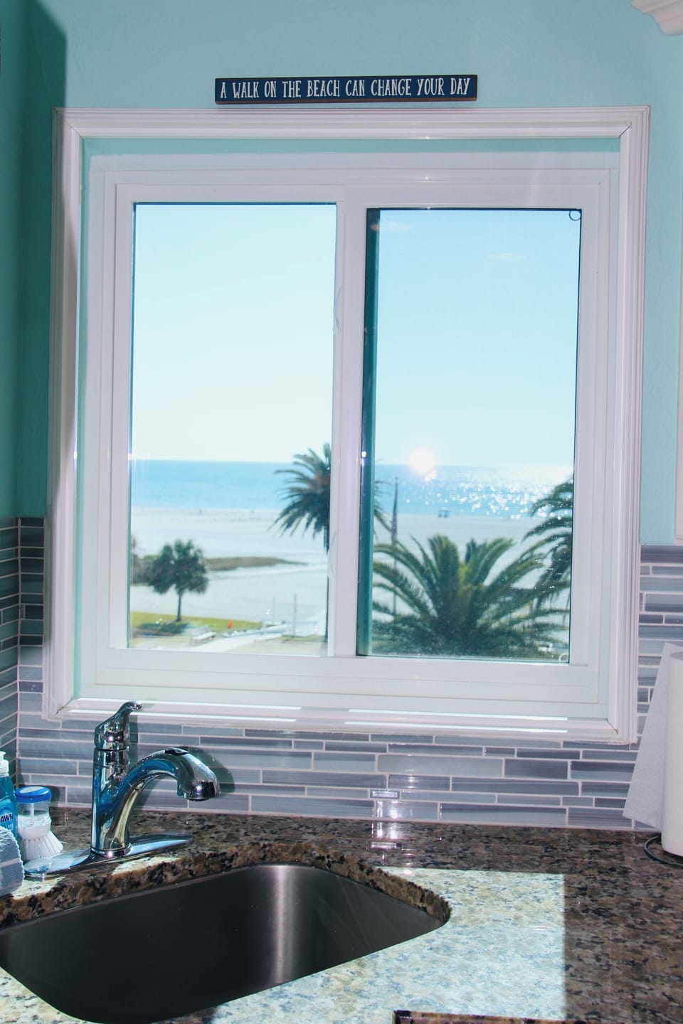 Beautiful beach and pool views from the kitchen window.