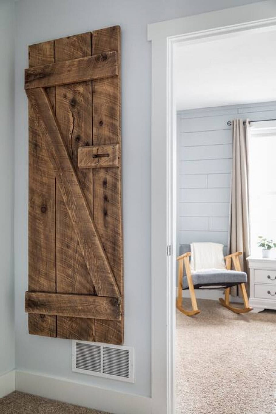 Rustic barn-style decor adds charm to this inviting room view! 🚪✨