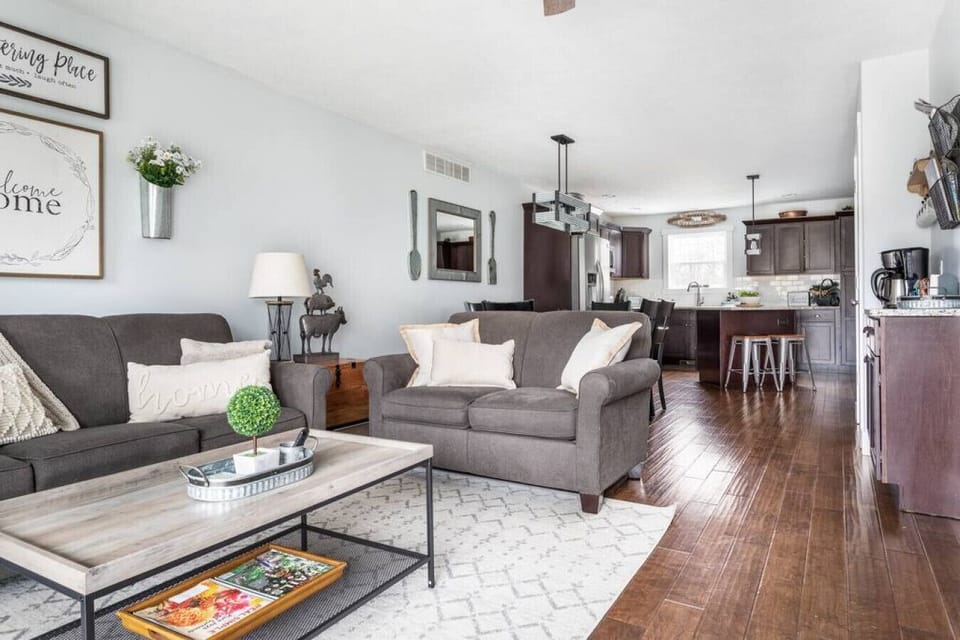 Comfortable living area connecting to the kitchen and dining space! 🛋️🍴
