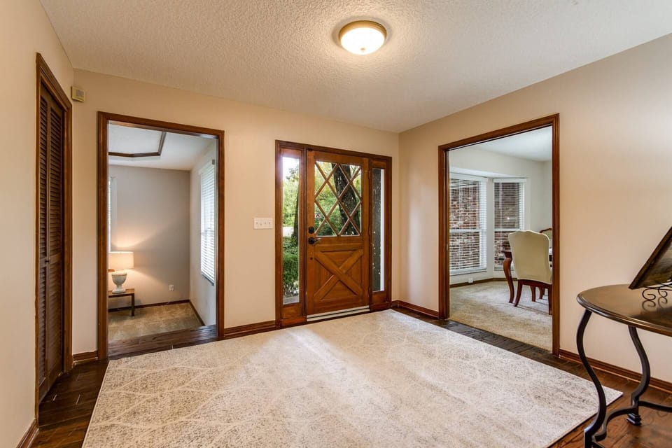 Front Entrance - Dining Room and step down into the game & movie room