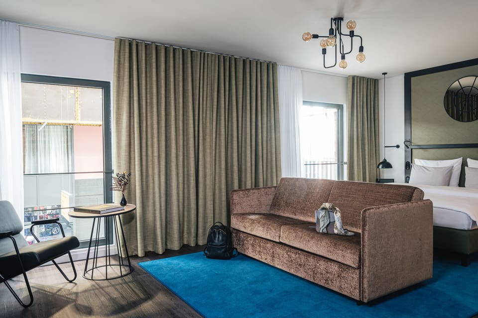 Premium Double Room | Living area | 55-inch flat-screen TV with cable channels, TV