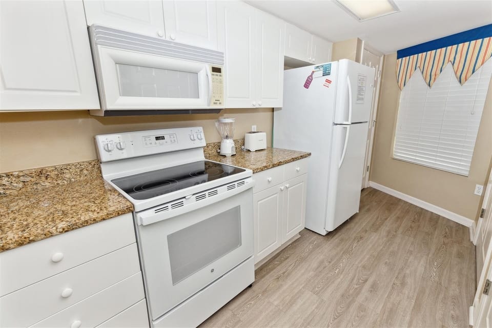 Condo, 2 Bedrooms | Private kitchen | Fridge, coffee/tea maker, toaster