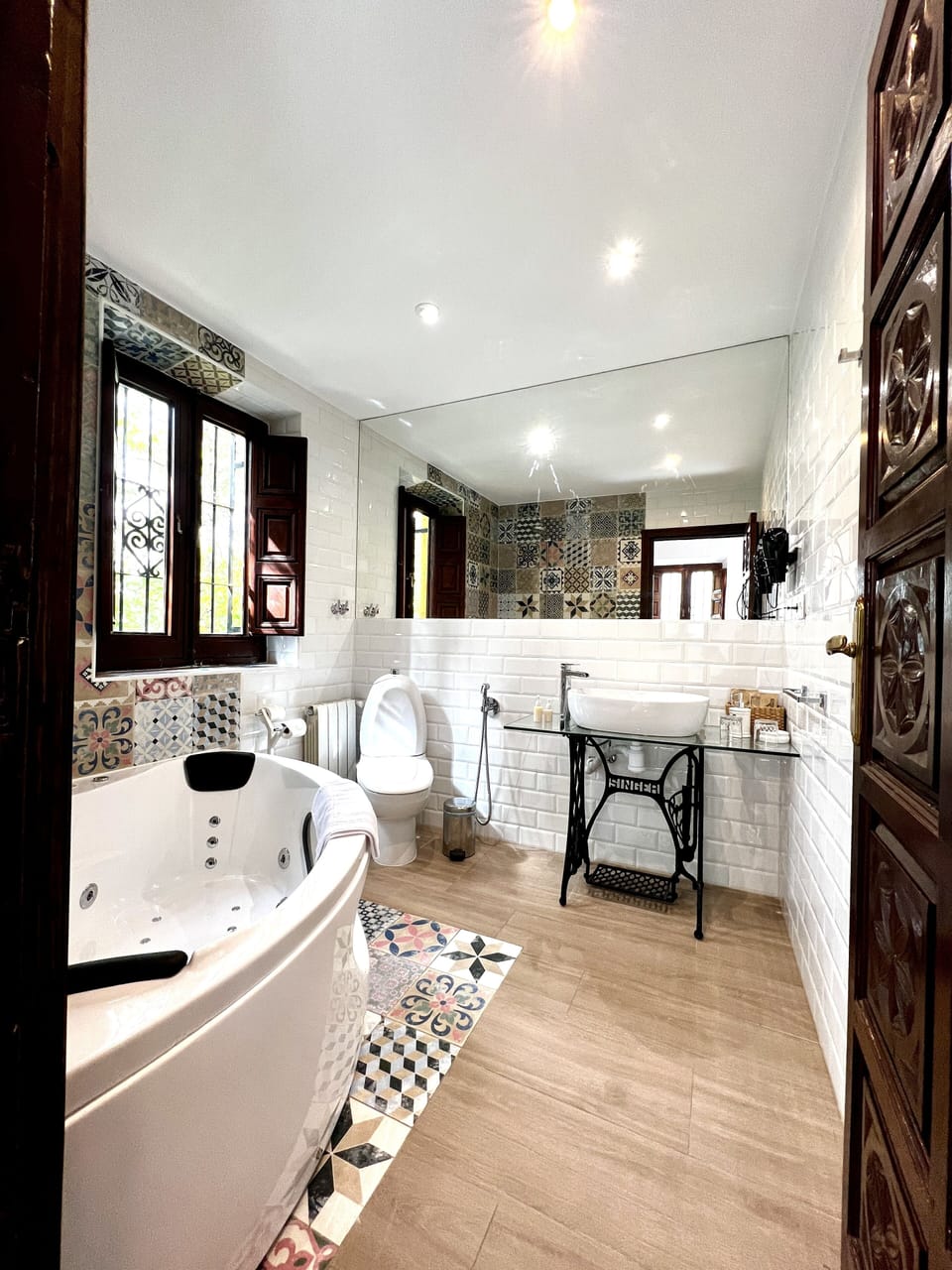 Deluxe Studio Suite | Bathroom | Hair dryer, towels, soap, shampoo