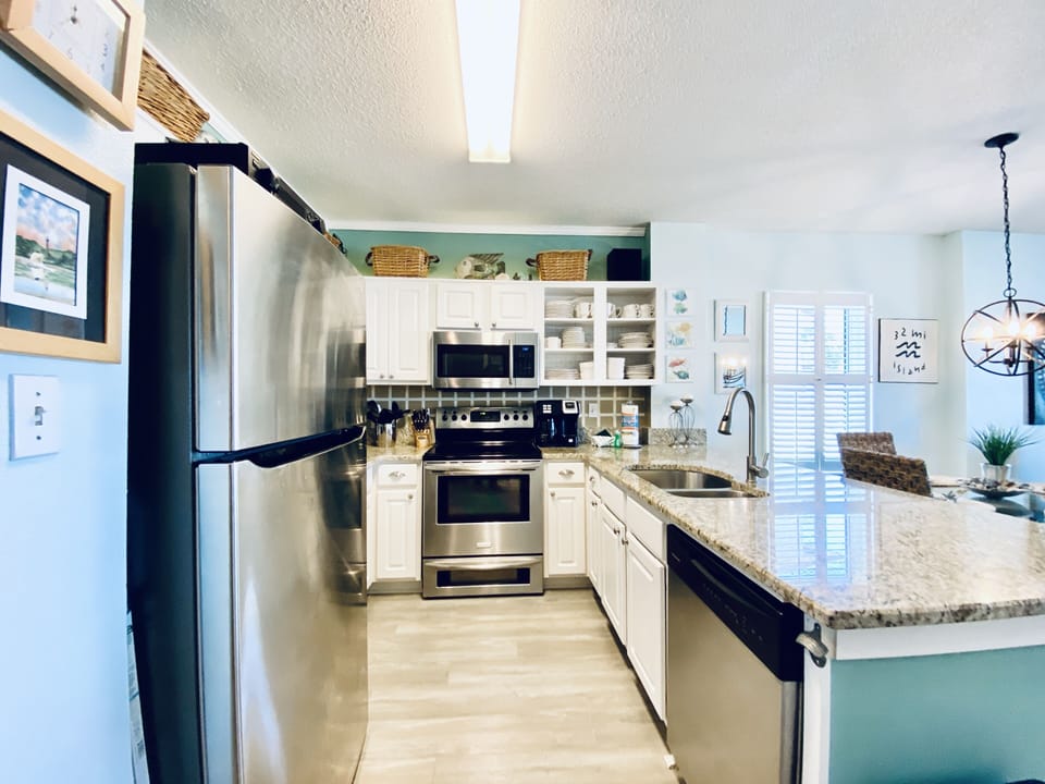 Condo, 2 Bedrooms, Balcony, Beachfront (101) | Private kitchen | Fridge, microwave, oven, stovetop
