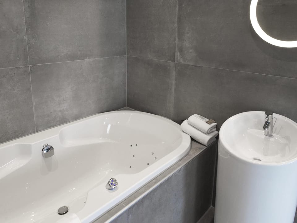 Pillowtop beds, desk, blackout drapes, soundproofing