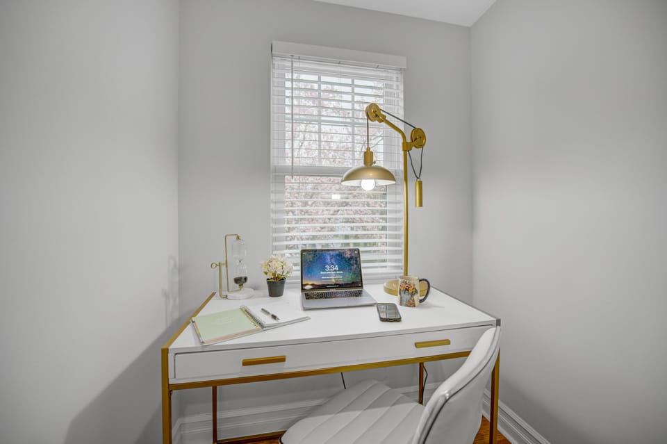 Cherry blossom tree serves as the backdrop for the upstairs office space.