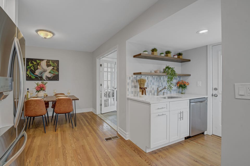 Kitchen is located immediately next to the dining room and sunroom.
