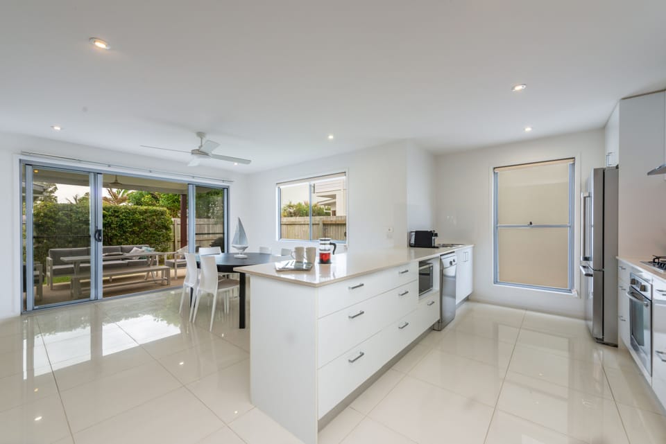 Kitchen with indoor/outdoor dining areas