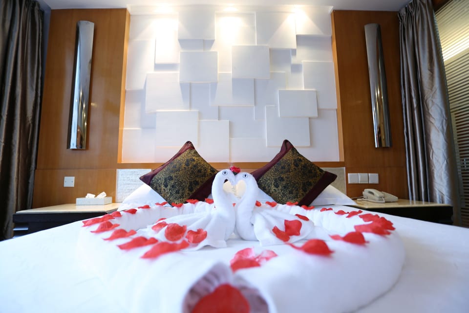Premium bedding, pillowtop beds, minibar, in-room safe