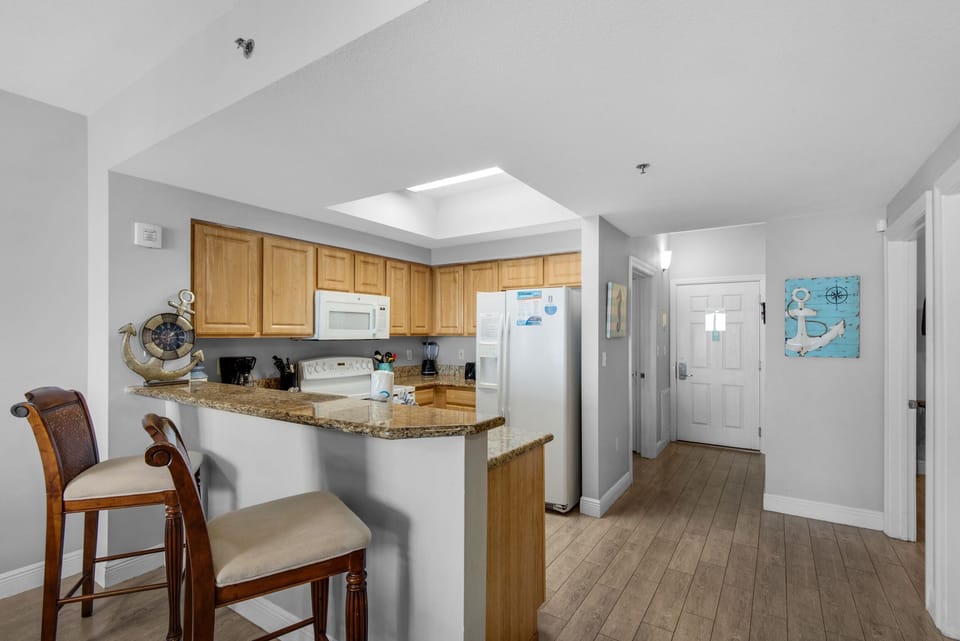 Kitchen with eat-in bar seating