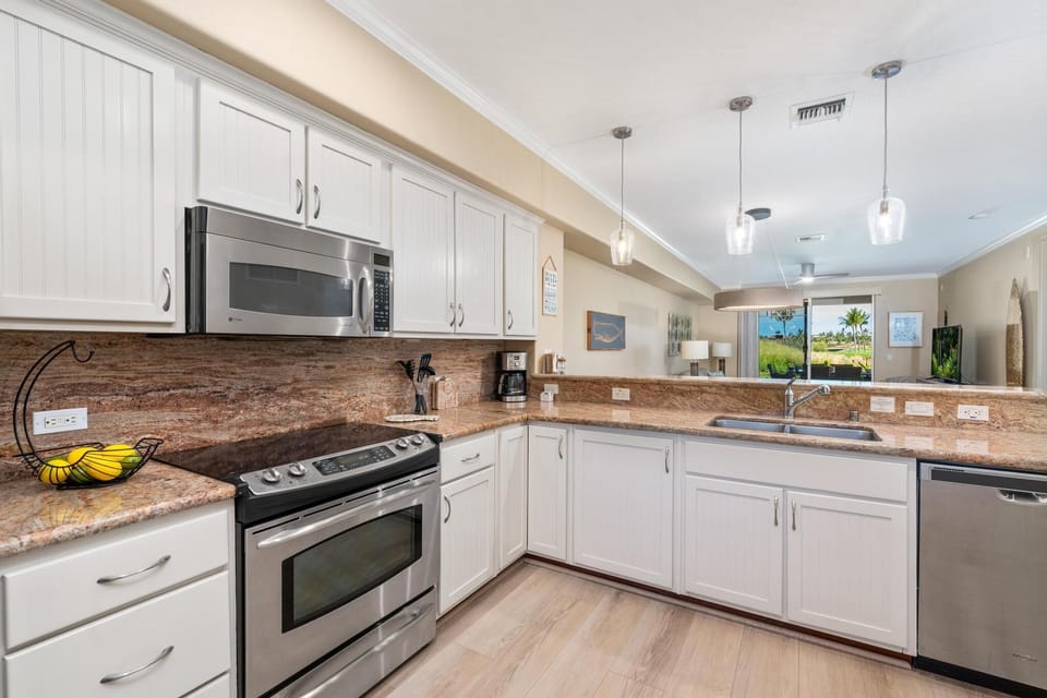 Fully equipped kitchen with granite counters and stainless steel appliances