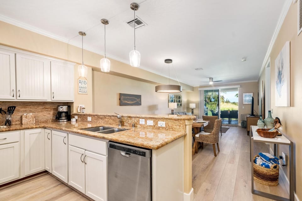 Fully equipped kitchen with granite counters and stainless steel appliances