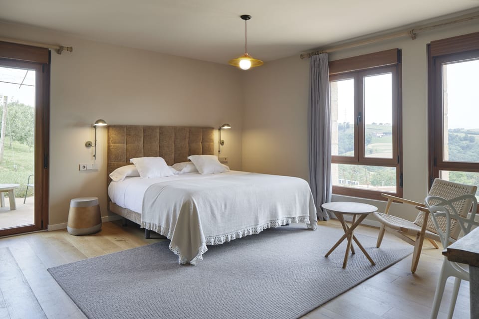Deluxe Room | Down comforters, minibar, in-room safe, individually decorated
