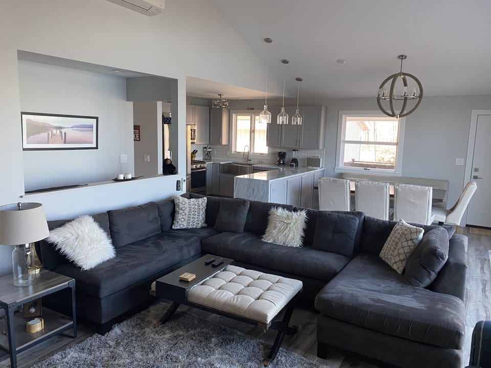 Comfortable living room sectional, 2 chairs with gas fireplace, satellite TV