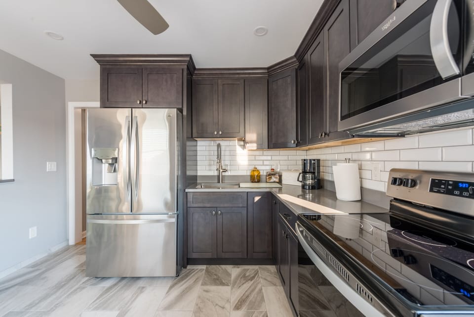 French door refrigerator with built in water dispenser and ice maker 