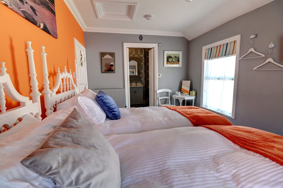 Twin Room or King Room | Egyptian cotton sheets, premium bedding, blackout drapes, WiFi (free)