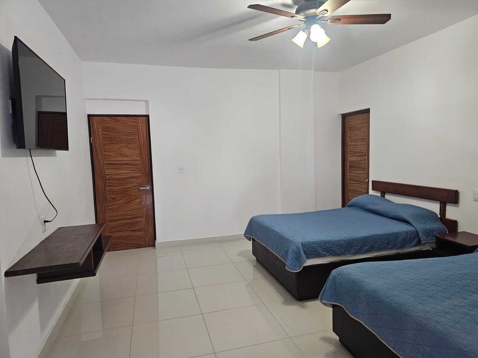 Family Room | Desk, free WiFi, bed sheets