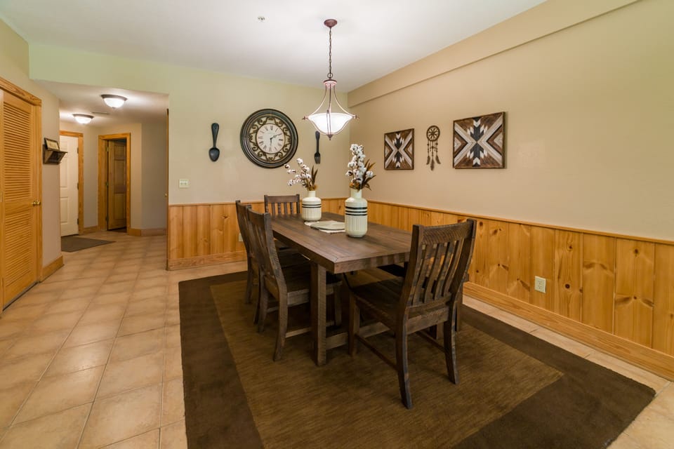 Large dining area with seating for 6, perfect for meals or game nights