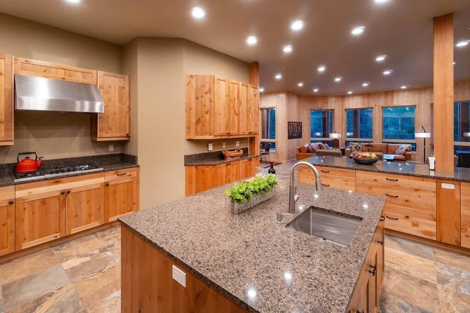 Kitchen view to bar and living area