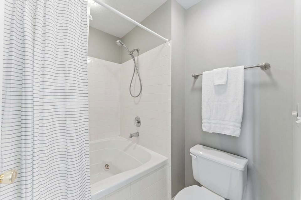 Attached master bathroom with jetted tub