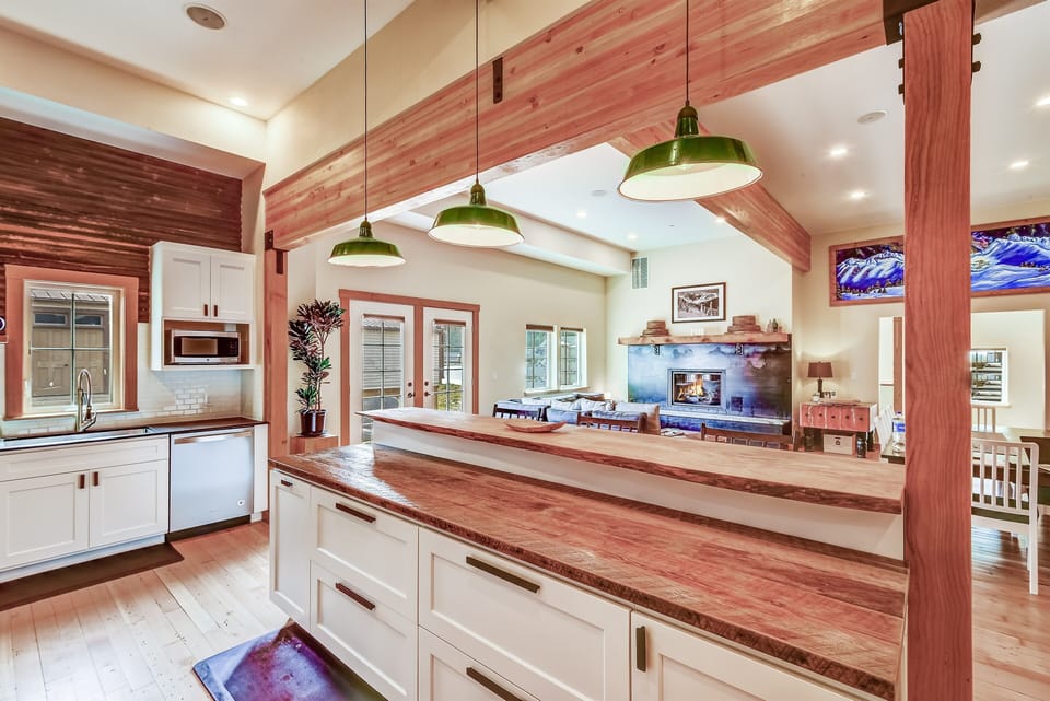 Plenty of space for food, family and friends in this 3,166 sf lodge.