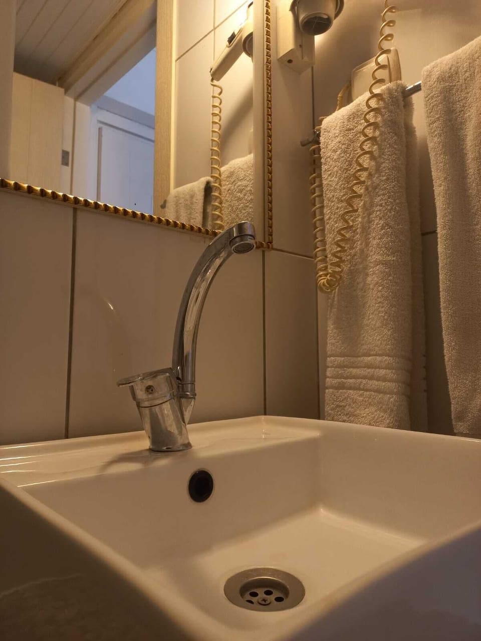 Shower, free toiletries, hair dryer, slippers