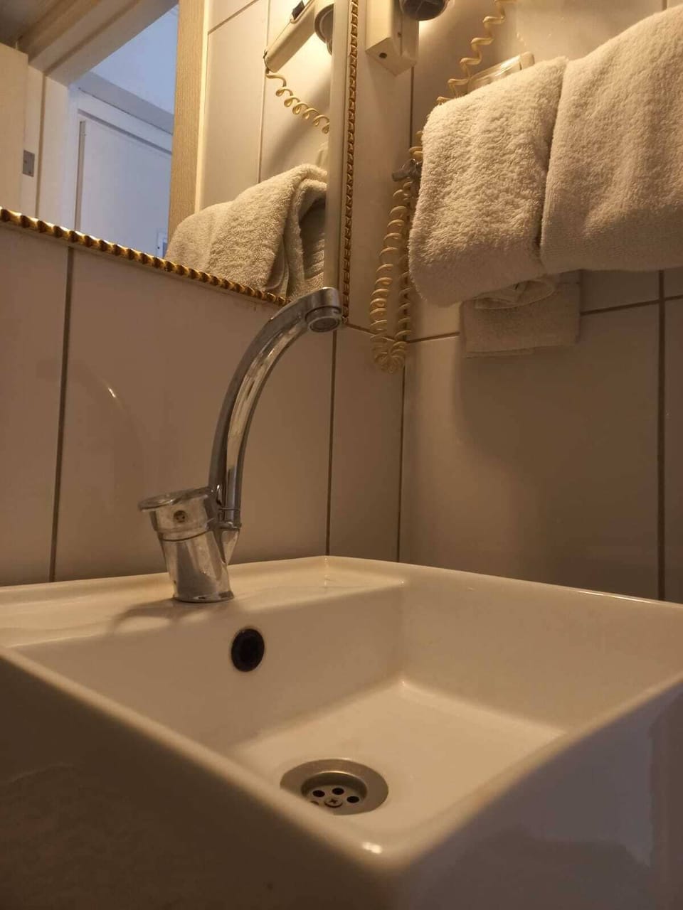 Shower, free toiletries, hair dryer, slippers