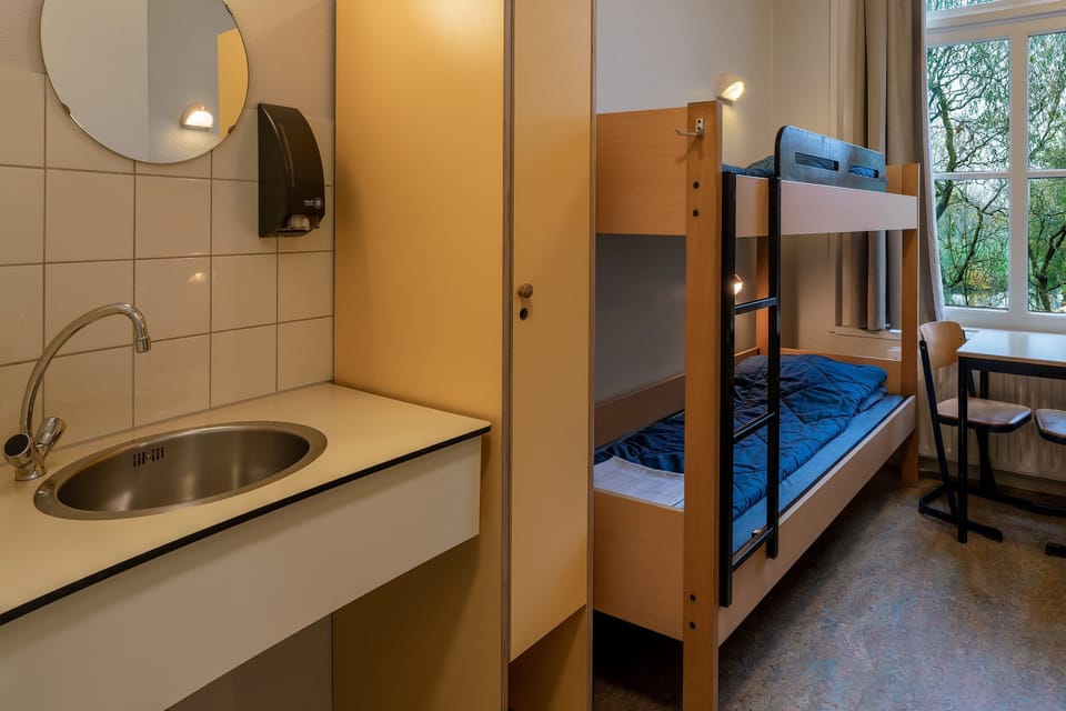 Basic Twin Room, Private Bathroom (Bunk beds) | In-room safe, WiFi (free), bed sheets