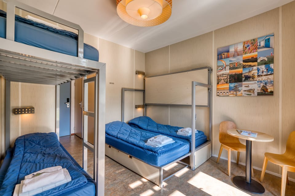 Family Quadruple Room, Patio | WiFi (free), bed sheets