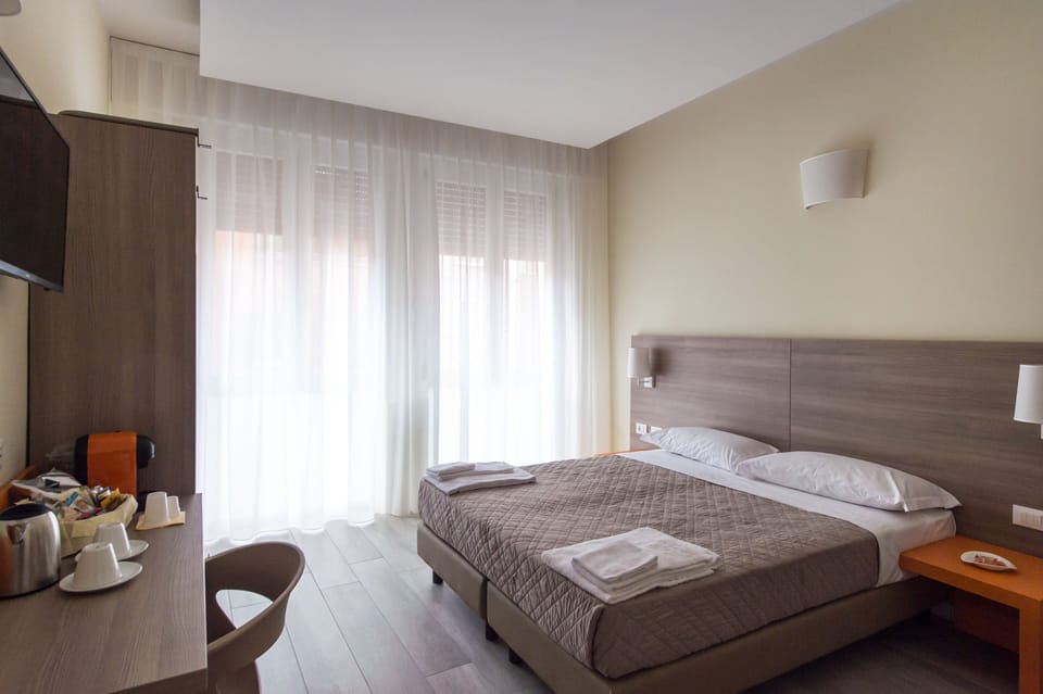 Family Room | Minibar, in-room safe, desk, laptop workspace