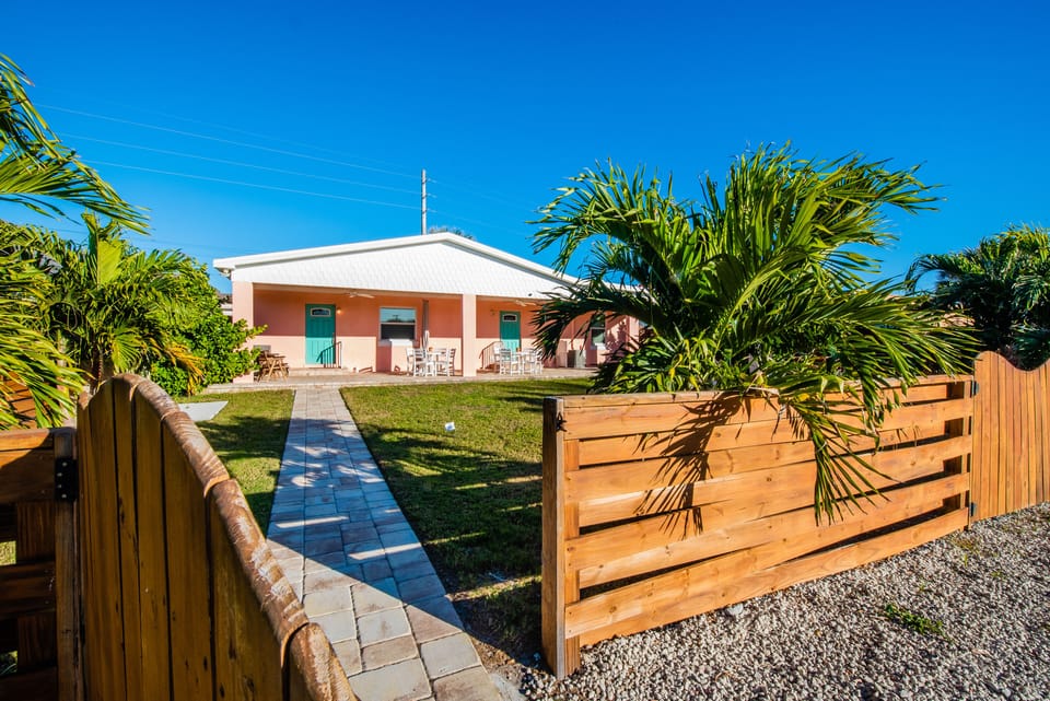 Private Back Yard - The backyard is fenced with 2 showers and 2 entries into the house.