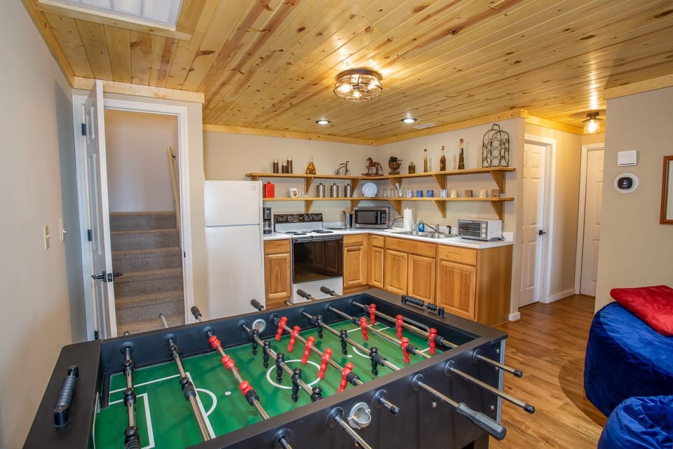 Foosball Table in Lower Level Den and Game Room