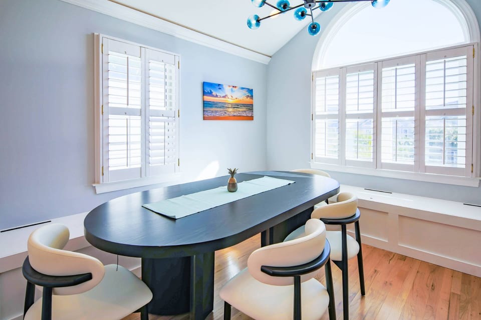 The dining table seats up to 8 people.