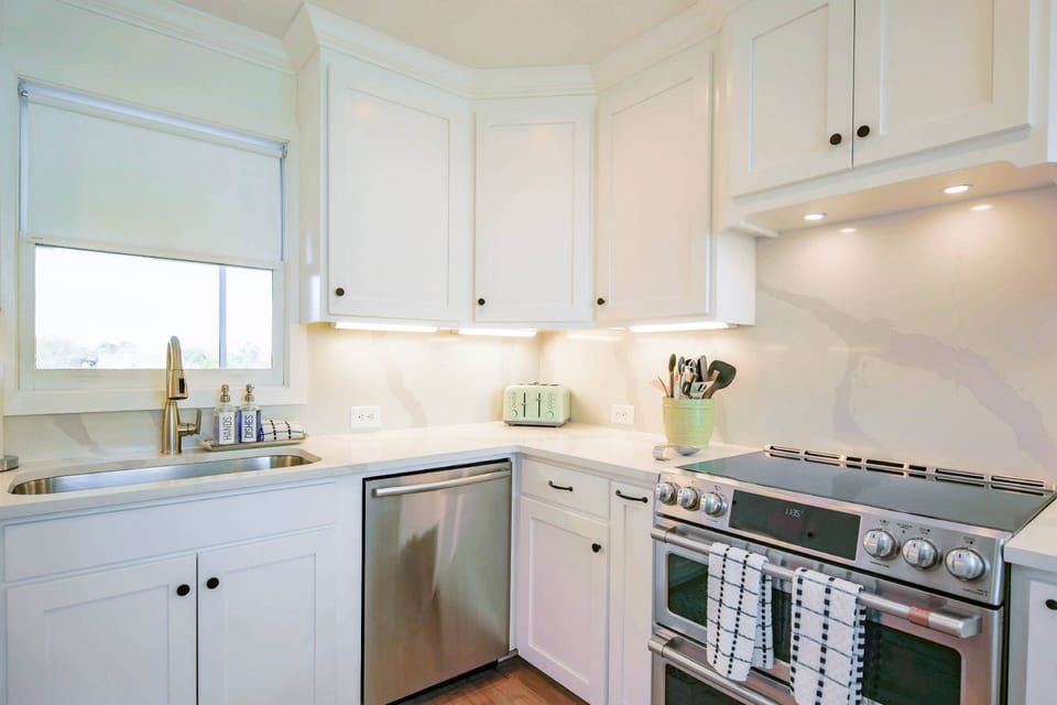There's plenty of room in the kitchen for you and your guests to prepare your meals.
