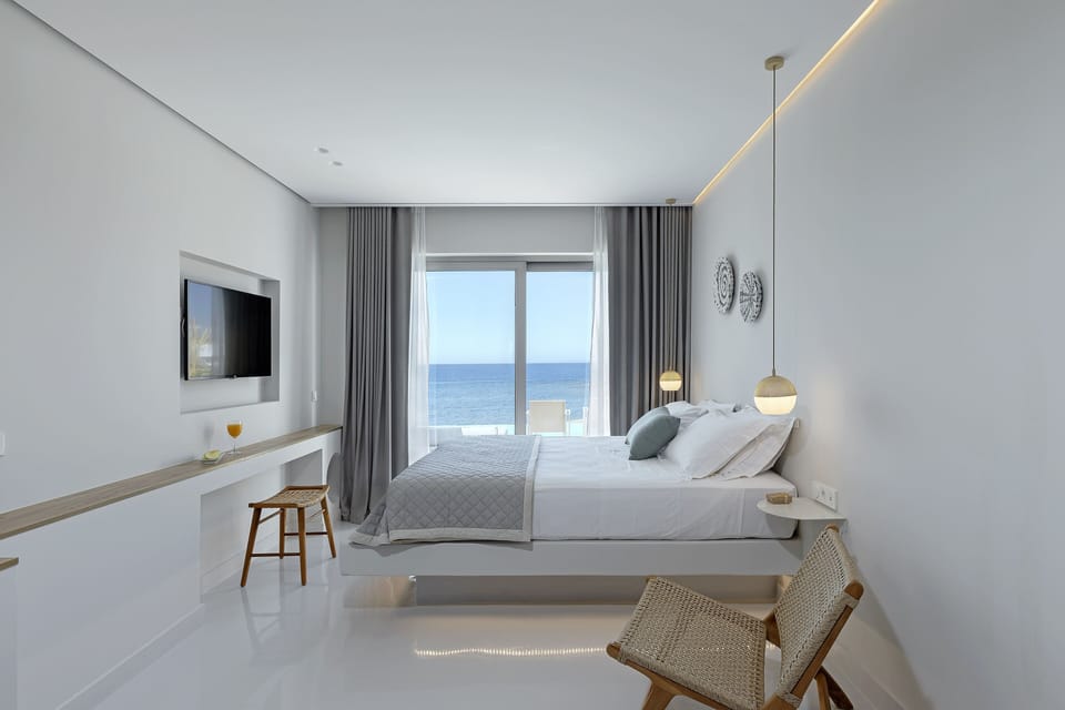 Premium Double Room, Sea View (Direct Pool Access) | Minibar, in-room safe, blackout drapes, iron/ironing board