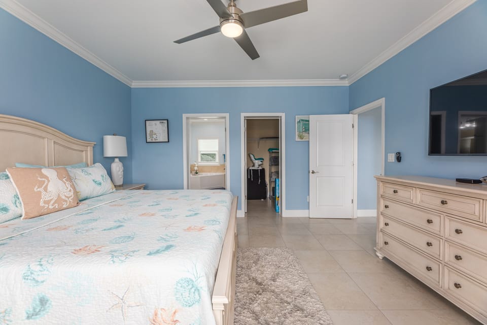 King size bed with master bath, french doors leading to outside
