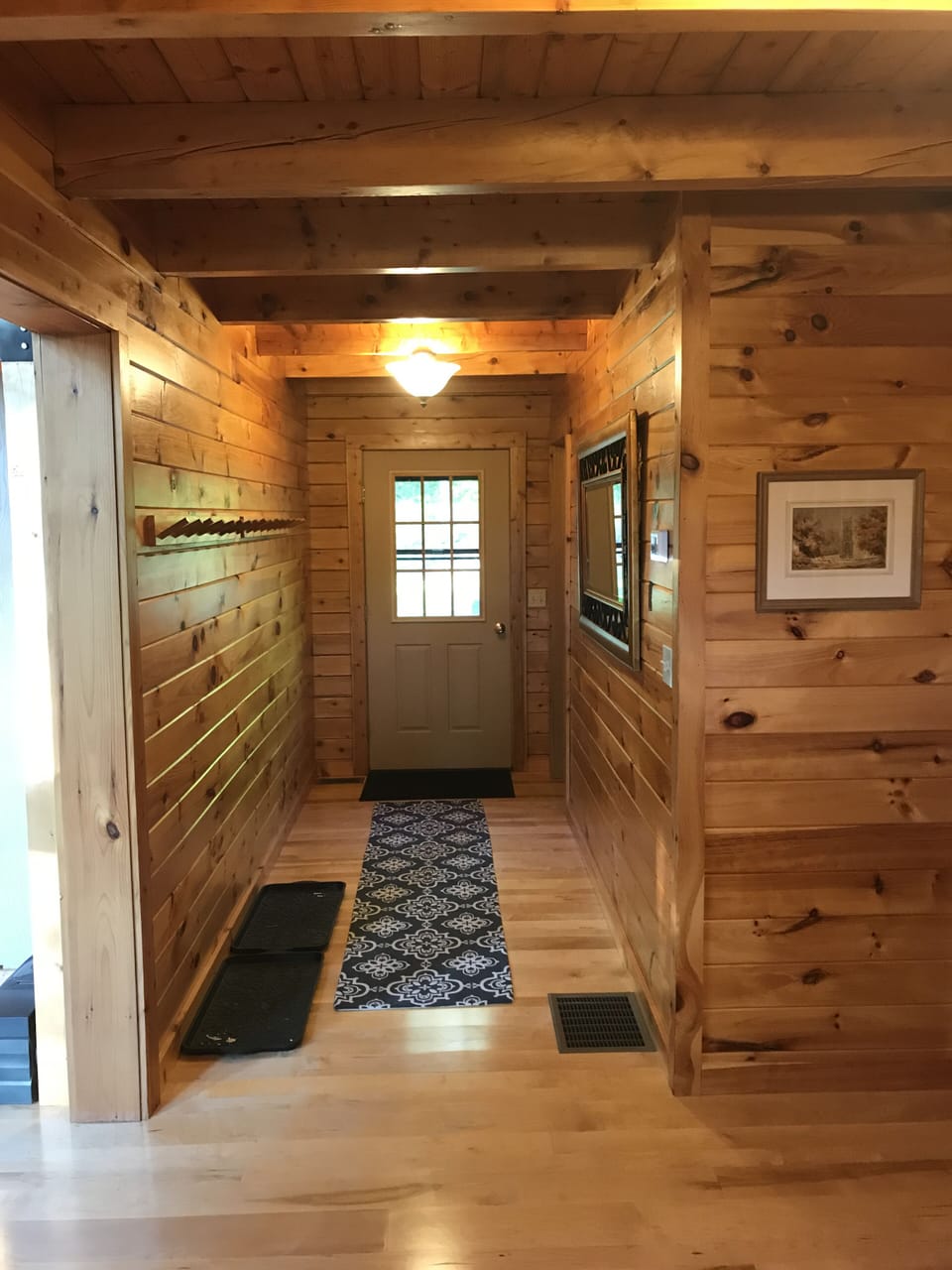 Front hall view to back door.