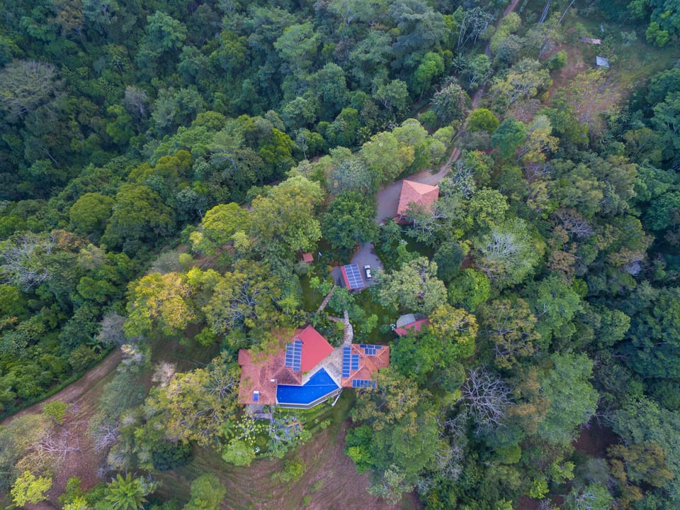 Aerial view of main house with separate casita behind. No neighbours in site.
