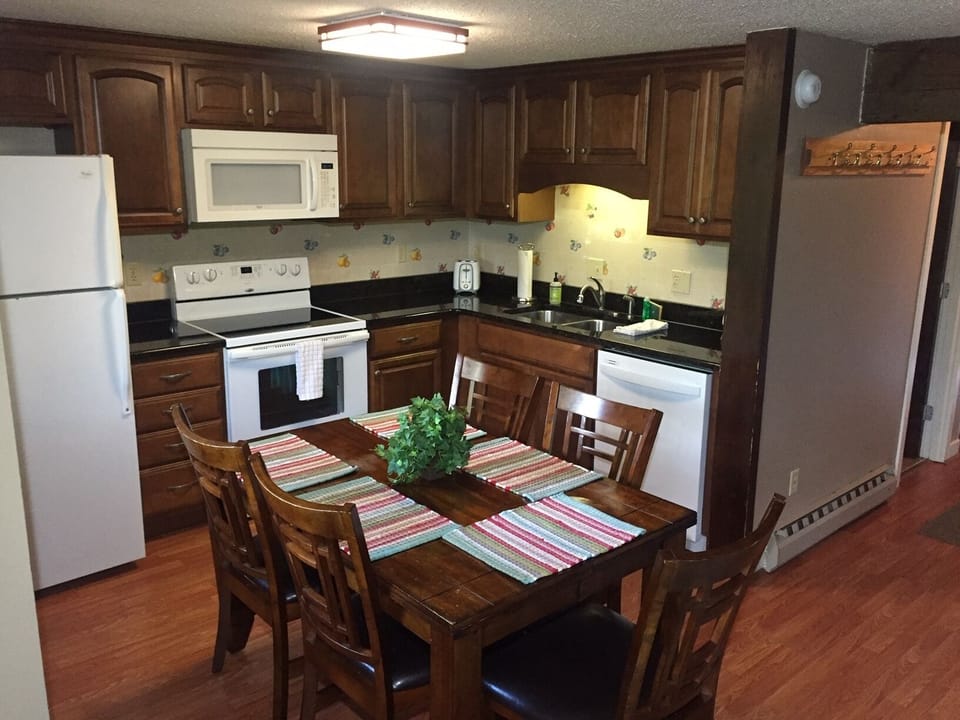 Kitchen has been recently remodeled. Table has leaf and chairs to seat 8 total. 