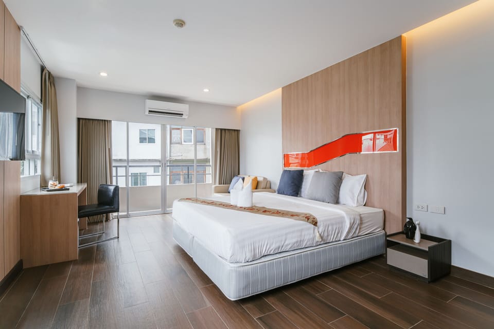 Executive Room | Hypo-allergenic bedding, in-room safe, desk, soundproofing