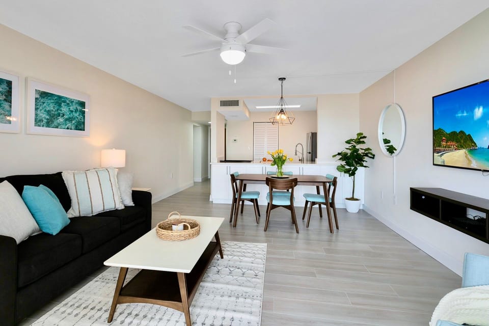 Bright, beautiful, and beachy! A modern living and dining space with a fresh coastal vibe.